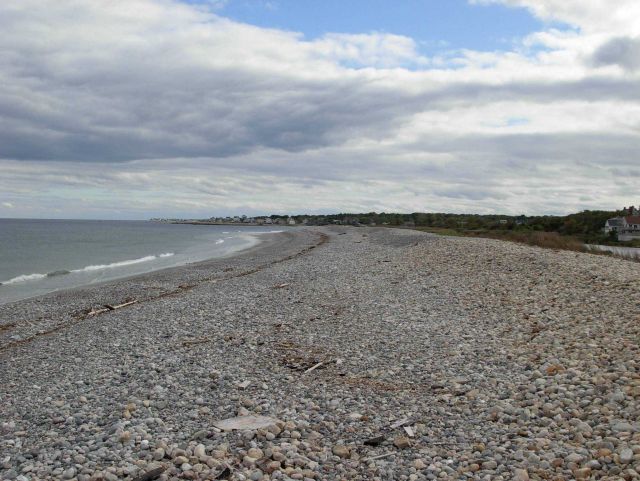 The storm surge and surf protection wall composed of cobbles at Scituate. Picture