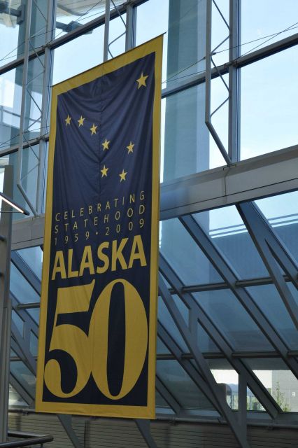 Sign at Anchorage Airport celebrating 50 years of Statehood. Picture