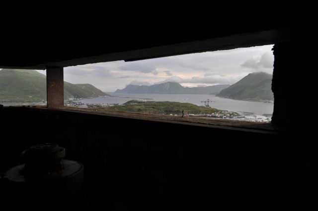 Looking out the view ports of the World War II lookout bunker at Dutch Harbor. Picture