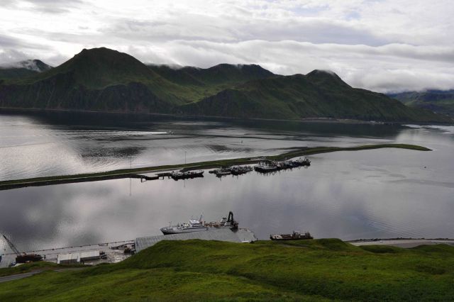 Man-made breakwater sheltering vessels at Dutch Harbor. Picture