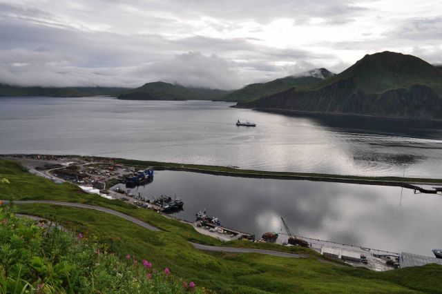 Man-made breakwater sheltering vessels at Dutch Harbor. Picture