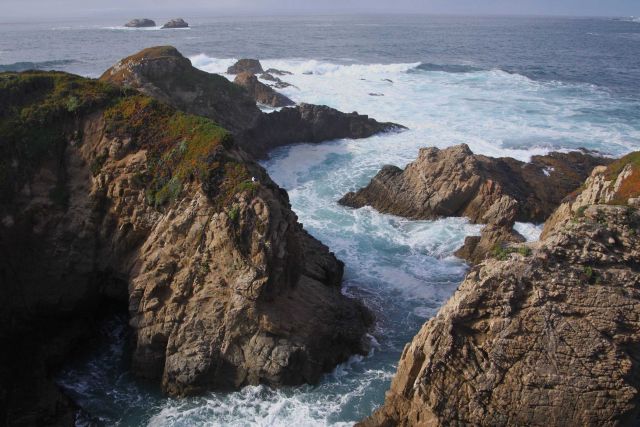 The rocky, wave-sculpted coastline near Granite Canyon. Picture
