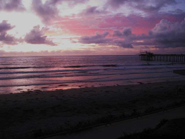 The end of day at Scripps Institution of Oceanography - the last surfers have left the water and the waves roll in unridden. Picture