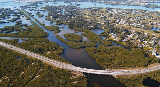Buildup over wetlands and modification of wetland drainage patterns. Picture