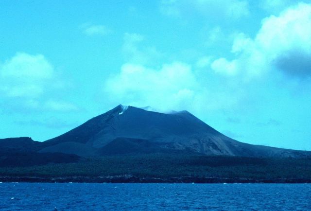 Pagan Volcano showing the crater breach on the left that occurred during a 1981 eruption. Picture