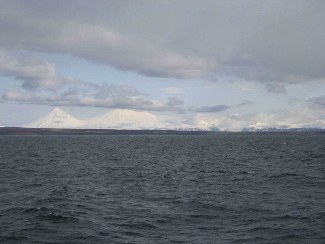 Pavlof Sister and Pavlof Volcano from the north side of the Alaska Peninsula. Picture