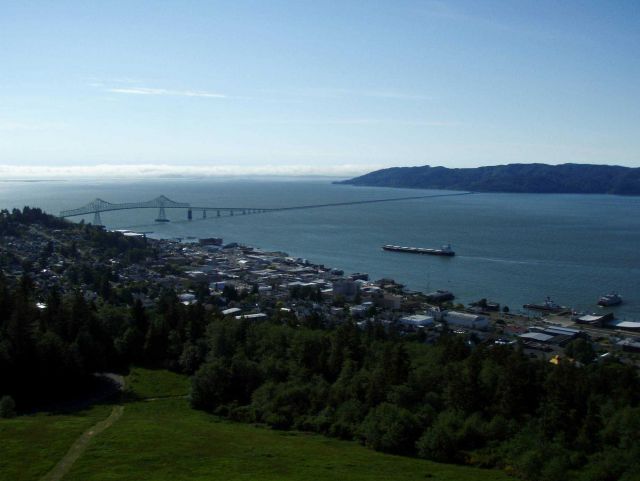 A merchant vessel approaching the Astoria-Megler Bridge as it is outbound headed to the Pacific Ocean. Picture