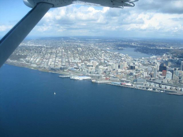 Aerial view of Seattle waterfront with Space Needle in center and Lake Union in upper right center. Picture