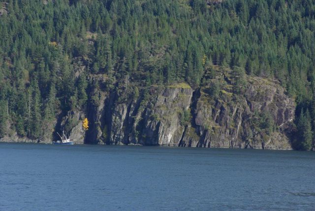 A small commercial fishing vessel passing the Cape Mudge area, British Columbia. Picture