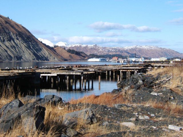 Looking over crumbling piers to the Coast Guard Base at Kodiak. Picture