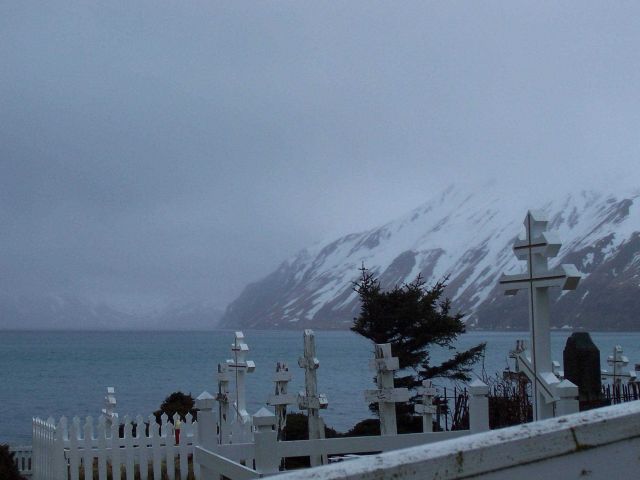 Crosses at the Russian Orthodox Cemetery at Dutch Harbor on a gray and wintery day. Picture