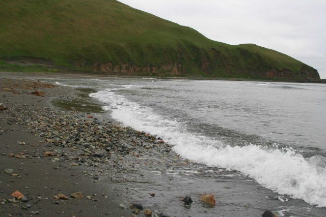 A concentration of cobbles along a Dutch Harbor beach attesting to the sometimes power of the surf here. Picture