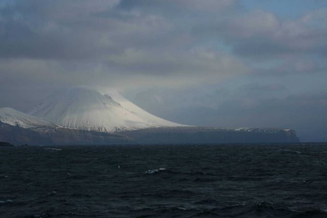 A rugged coastline in the Islands of the Four Mountains. Picture