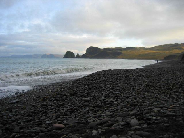 A boulder beach on the coast of St Picture