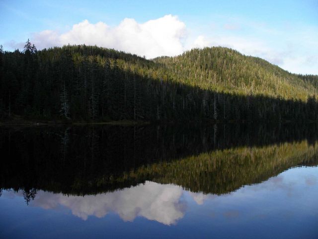 A still evening with reflections at Harriet Hunt Lake near Ketchikan. Picture
