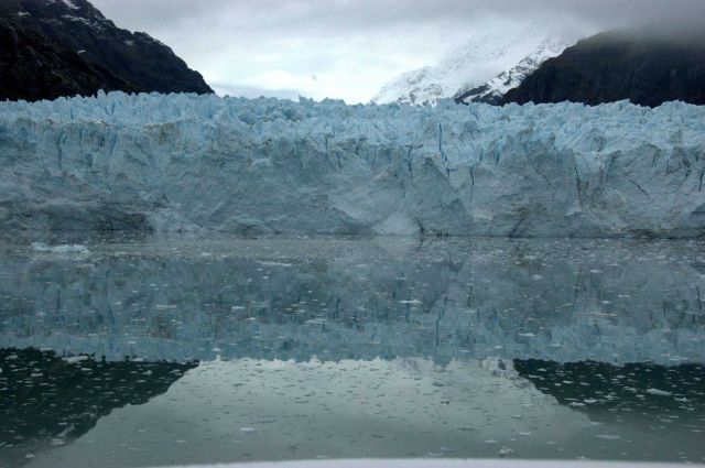 Reflections of a glacier front. Picture