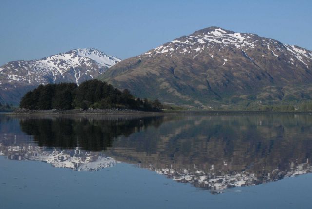Kodiak mountain reflections on a calm cove. Picture