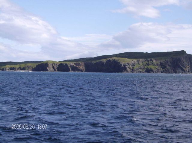 Cliffs along the shoreline of the Shumagin Islands. Picture