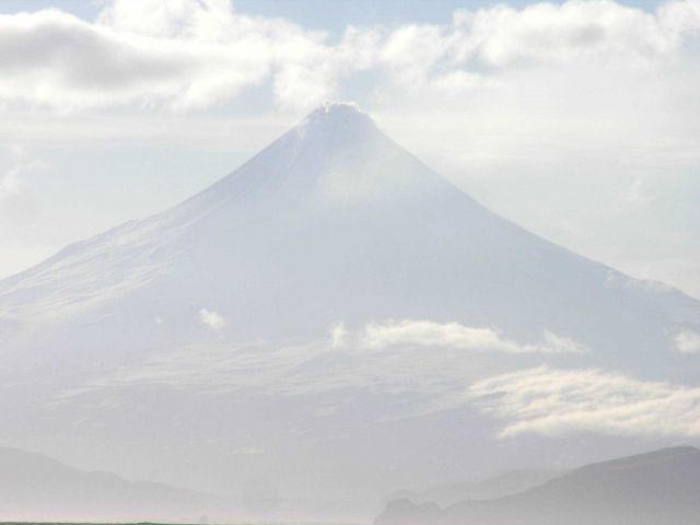Shishaldin Volcano, among the most perfectly symmetrical volcanic cones on Earth . Picture