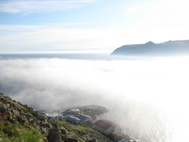 Foggy and water as seen from top - Little Diomede Island, Alaska Picture