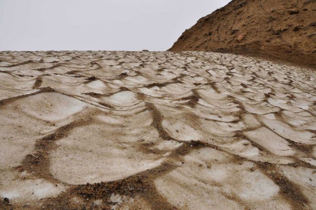 Strange surface of ice at Tin City area - reminiscent of dessicated lake bed. Picture