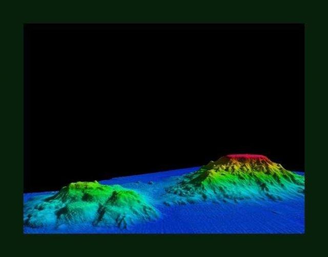 3-D view of Giacomini and Ely Seamounts in the Gulf of Alaska shows the rugged flanks and flat tops typical of seamounts in this area. Picture