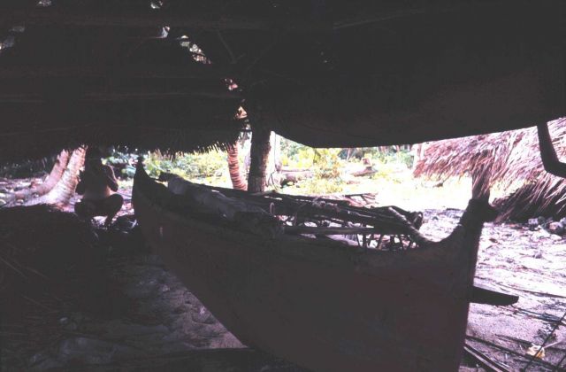 Native outrigger canoe in storage house Picture