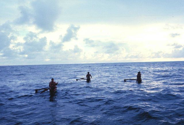 Native Micronesian fishermen greeting the TOWNSEND CROMWELL Picture