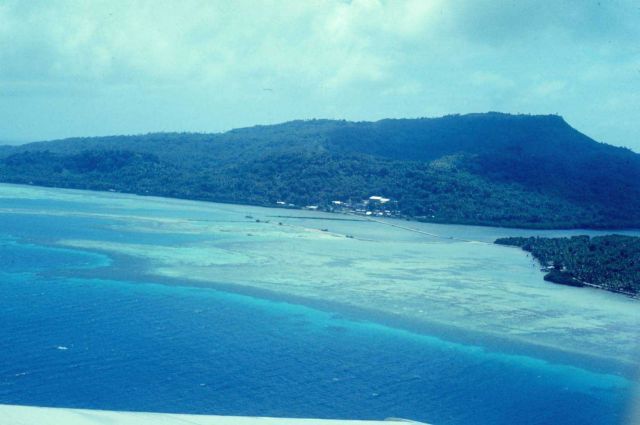 Causeway with remnants of coral dredging operation for construction. Picture