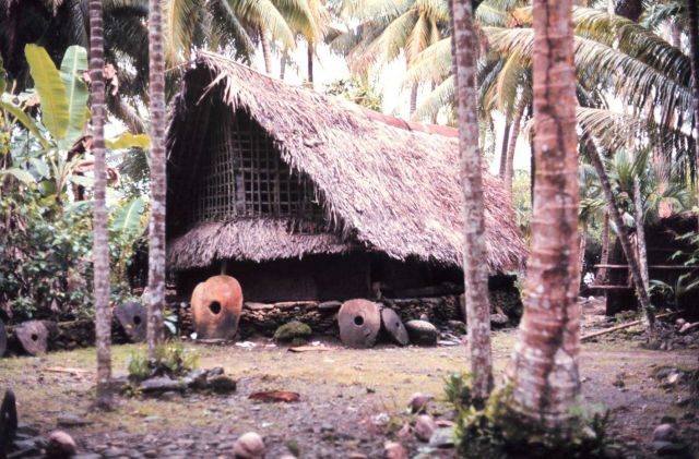 Native home with Yapese money stones indicating great wealth Picture