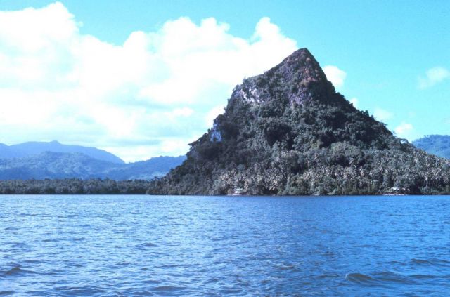 A conical hill adjacent to the sea. Picture