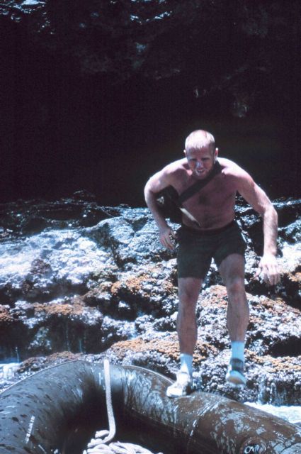 Dave Olsen of National Park Service jumping to zodiac launch at Lisianski Island Picture