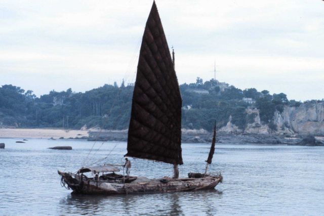 Sampan sailing on river Picture