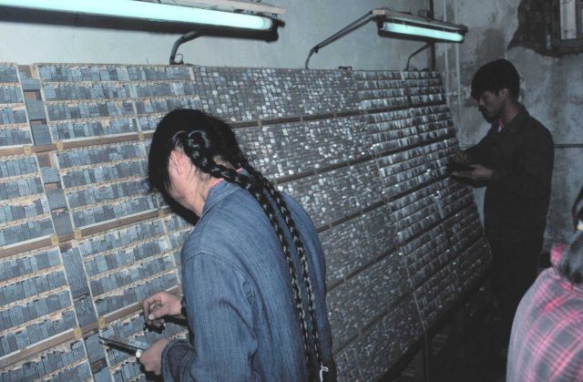 Typesetting by hand in a Chinese printshop Picture