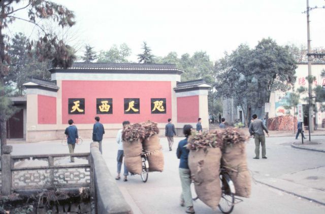 Street scene in rural town with bicycle transportation used for relatively heavy hauling. Picture