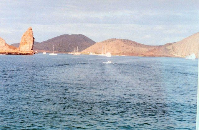 Boats anchored offshore from Pinnacle Rock Picture