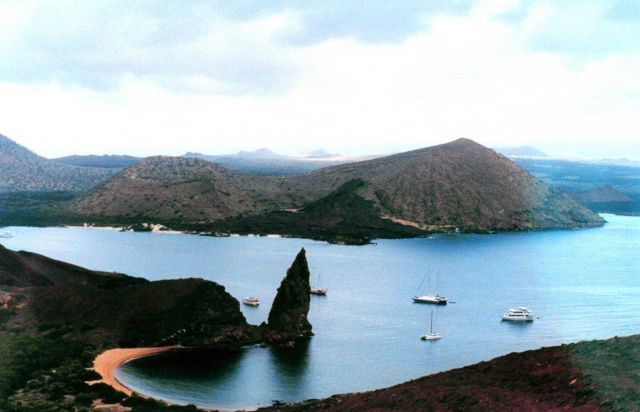 Boats anchored offshore from Pinnacle Rock Picture
