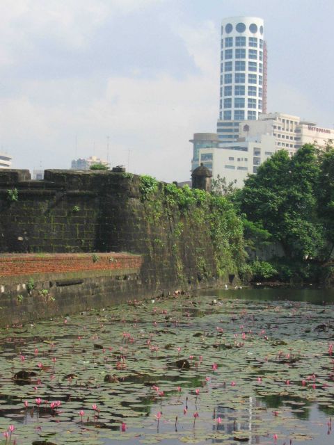 A view of a modern building from the inner fort of the Intramuros of Manila. Picture