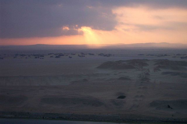 Looking out over a sea of sand from the SEALAND COMMITMENT while passing through the Suez Canal. Picture