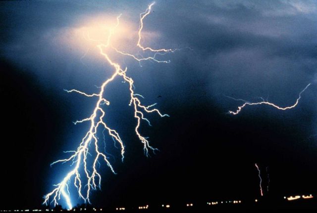 Multiple cloud-to-ground and cloud-to-cloud lightning strokes during night-time Picture