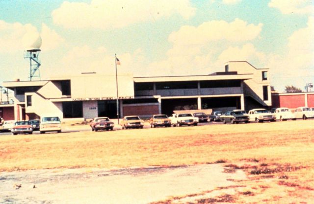 The National Severe Storms Laboratory (NSSL) research facility with radar dome in the background. Picture