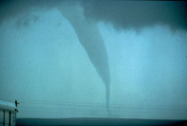 Tornado visible through the rain and mist. Picture