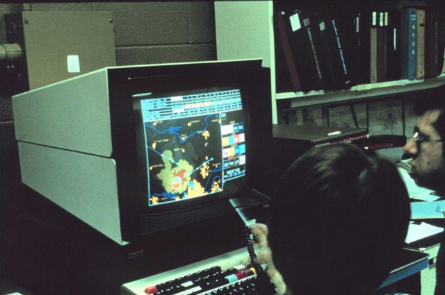 Weather surface forecast office personnel monitoring storm near Oklahoma City. Picture
