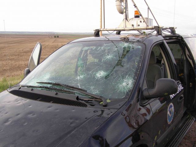 The tornadic storm observed earlier was accompanied by large dangerous hail which smashed the windshield of this National Severe Storms Laboratory ins Picture