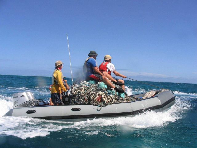 Returning to the contract vessel CASITAS with a load of derelict nets. Picture