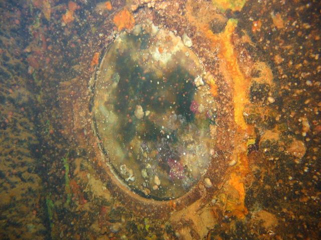 Porthole on the Kansho Maru. Picture
