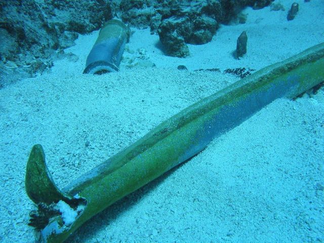 Lead ballast from ship wreck of early Nineteenth Century whaling vessel on Pearl and Hermes Reef. Picture