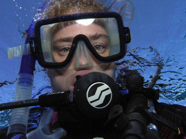 Human female (Homo sapiens aquaticus) on the reef. Picture