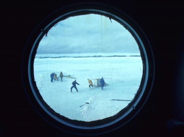 Unloading at the ice edge through porthole Nella Dan Picture