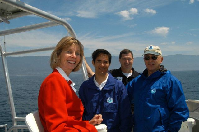 Congresswoman Lois Capps with sanctuary employees Chris Mobley, Dana Wilkes, and National Marine Sanctuary Director Dan Basta. Picture